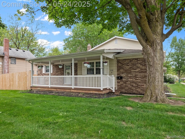 508 Chamberlain St Unit 8, Flushing, MI 48433 - ranch-style house featuring brick siding, a porch, and a chimney