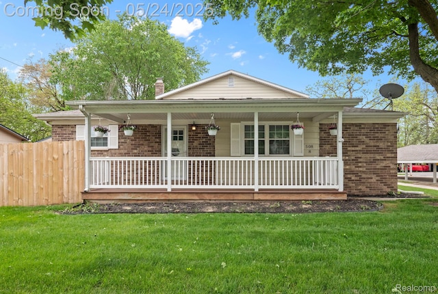 508 Chamberlain St Unit 8, Flushing, MI 48433 - single story home featuring brick siding and covered porch
