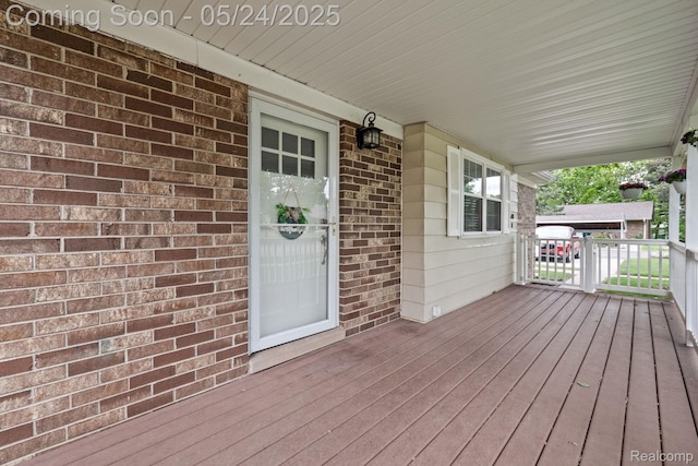 508 Chamberlain St Unit 8, Flushing, MI 48433 - view of wooden porch