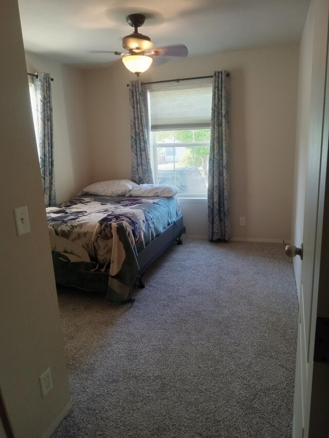 bedroom featuring carpet flooring and ceiling fan