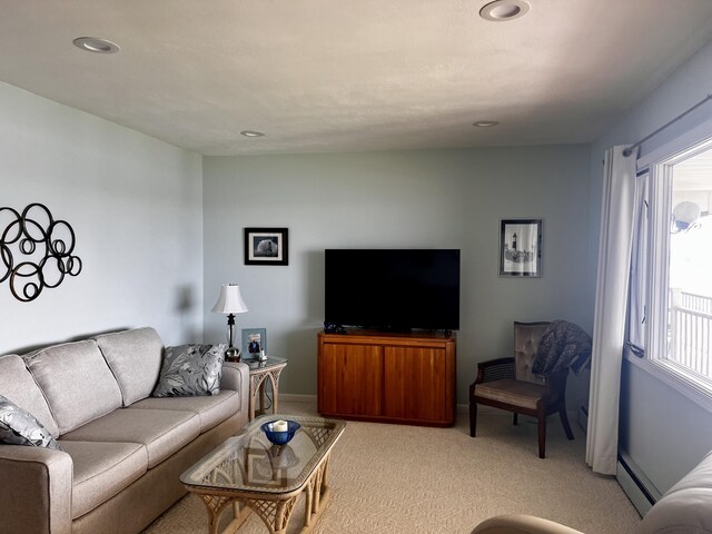 304 S Ferry St Unit 7, Ludington, MI 49431 - living room with light carpet, recessed lighting, and baseboards