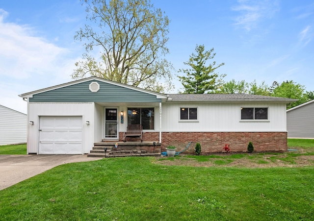 1837 Henbert Rd, West Bloomfield, MI 48324 - single story home featuring brick siding, an attached garage, a front lawn, concrete driveway, and covered porch