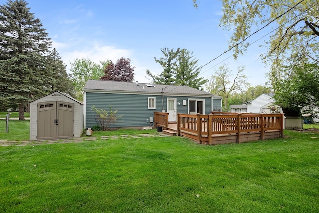 1837 Henbert Rd, West Bloomfield, MI 48324 - back of property with a storage unit, a deck, and an outdoor structure