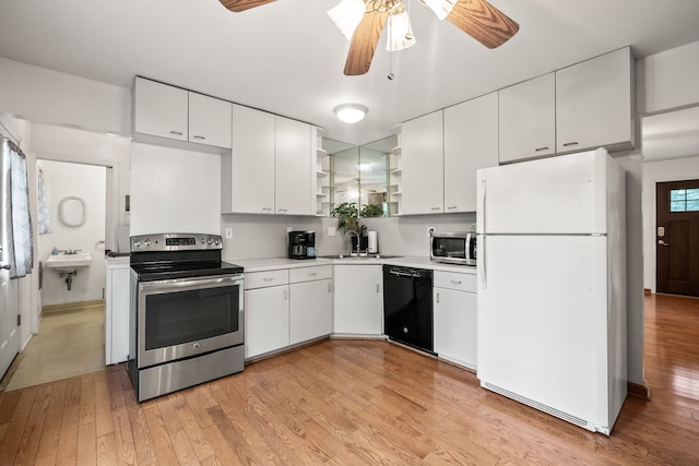 1837 Henbert Rd, West Bloomfield, MI 48324 - kitchen featuring appliances with stainless steel finishes, open shelves, a sink, and light wood-type flooring