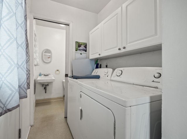 1837 Henbert Rd, West Bloomfield, MI 48324 - laundry room featuring independent washer and dryer, baseboards, and cabinet space