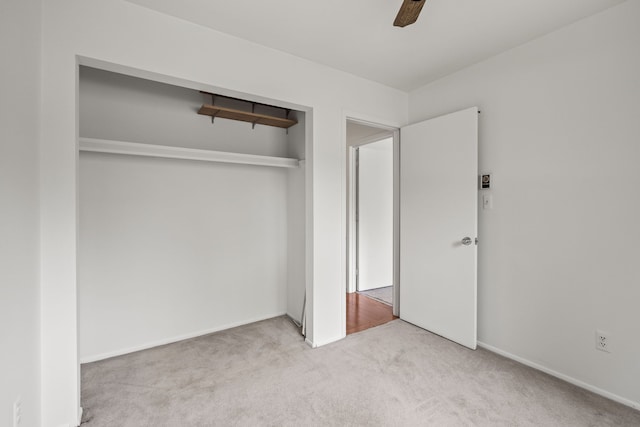 1837 Henbert Rd, West Bloomfield, MI 48324 - unfurnished bedroom with carpet, a closet, a ceiling fan, and baseboards