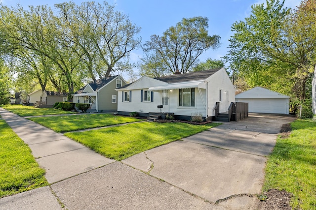 11354 Jackson Ave, Warren, MI 48089 - view of front of home featuring a detached garage, an outbuilding, a front lawn, and a chimney