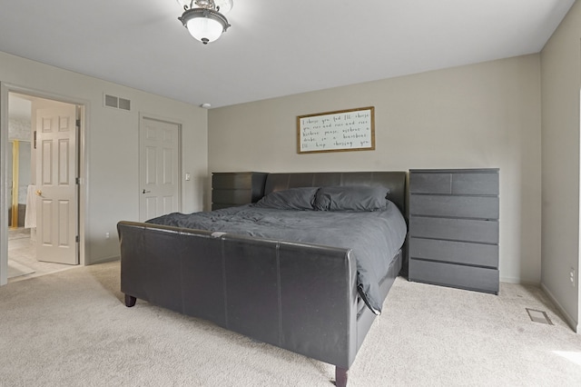 bedroom with light carpet