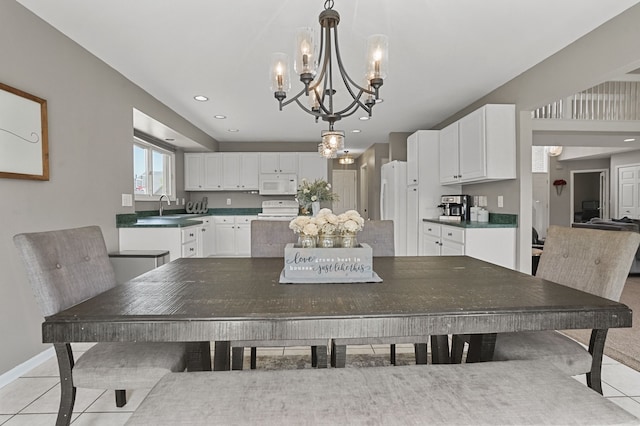 dining area with a chandelier, baseboards, recessed lighting, and light tile patterned floors