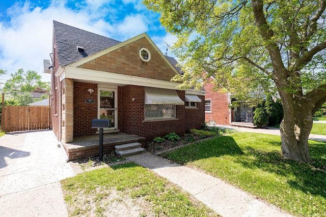 1526 S Gulley Rd, Dearborn Heights, MI 48125 - bungalow-style home with roof with shingles and brick siding