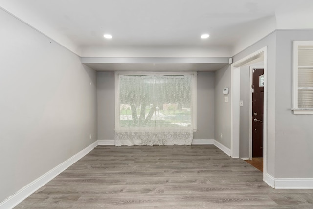 1526 S Gulley Rd, Dearborn Heights, MI 48125 - spare room with light wood-style floors, recessed lighting, and baseboards