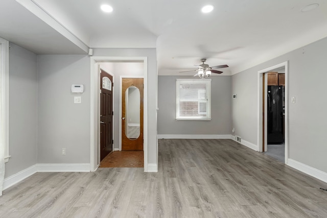 1526 S Gulley Rd, Dearborn Heights, MI 48125 - empty room with a ceiling fan, light wood-style flooring, baseboards, and recessed lighting
