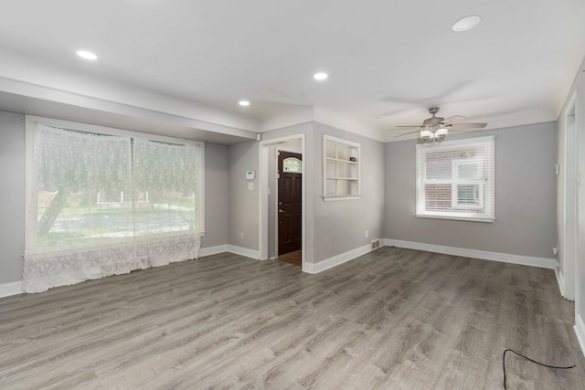 1526 S Gulley Rd, Dearborn Heights, MI 48125 - unfurnished room with baseboards, recessed lighting, wood finished floors, and a ceiling fan