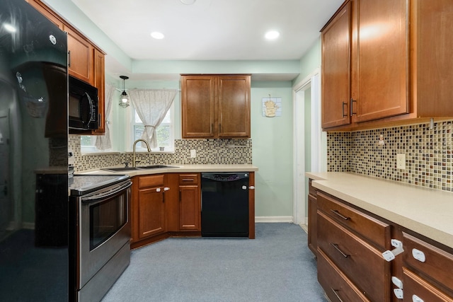 1526 S Gulley Rd, Dearborn Heights, MI 48125 - kitchen with black appliances, a sink, carpet, light countertops, and tasteful backsplash