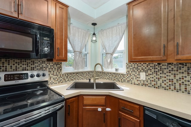 1526 S Gulley Rd, Dearborn Heights, MI 48125 - kitchen featuring black appliances, a sink, light countertops, and backsplash