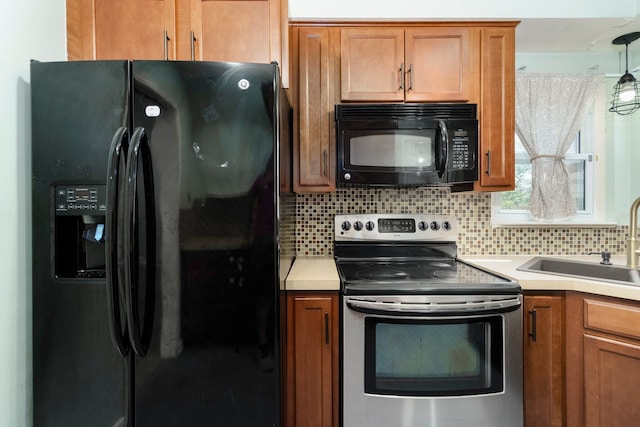 1526 S Gulley Rd, Dearborn Heights, MI 48125 - kitchen featuring black appliances, a sink, and brown cabinetry