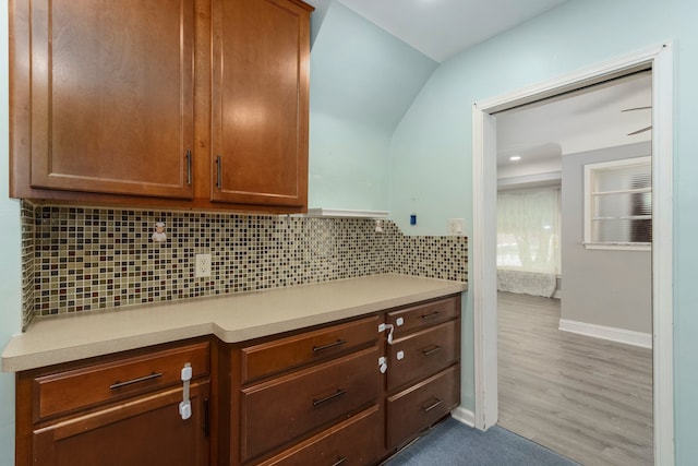 1526 S Gulley Rd, Dearborn Heights, MI 48125 - kitchen featuring light countertops, backsplash, baseboards, wood finished floors, and recessed lighting