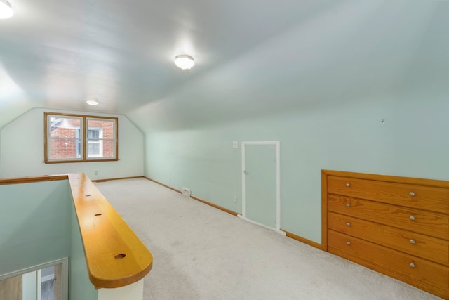 1526 S Gulley Rd, Dearborn Heights, MI 48125 - additional living space featuring lofted ceiling, baseboards, and carpet flooring
