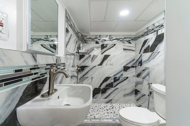 1526 S Gulley Rd, Dearborn Heights, MI 48125 - full bath with a sink, tiled shower, toilet, a paneled ceiling, and tile walls