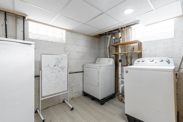 1526 S Gulley Rd, Dearborn Heights, MI 48125 - washroom featuring washing machine and clothes dryer and light wood-style floors
