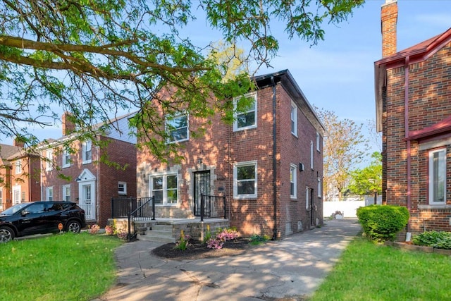 17550 Ohio St, Detroit, MI 48221 - view of front of house with brick siding and a front lawn