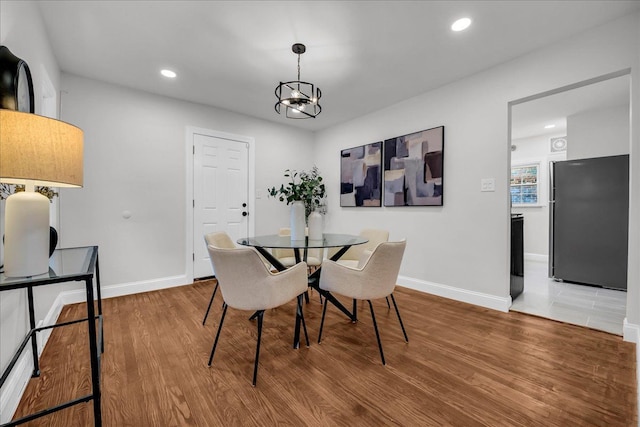 17550 Ohio St, Detroit, MI 48221 - dining space featuring baseboards, wood finished floors, a chandelier, and recessed lighting