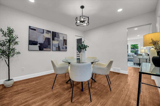 17550 Ohio St, Detroit, MI 48221 - dining space featuring wood finished floors, a chandelier, recessed lighting, and baseboards