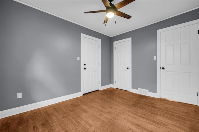 17550 Ohio St, Detroit, MI 48221 - unfurnished room featuring ceiling fan, baseboards, light wood-style flooring, and crown molding