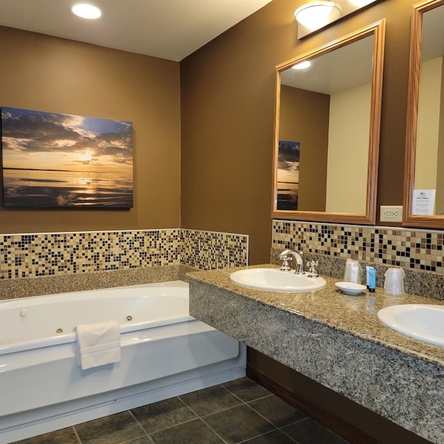 2400 Troon S, Bellaire, MI 49615 - bathroom with a jetted tub, tasteful backsplash, tile patterned floors, recessed lighting, and double vanity