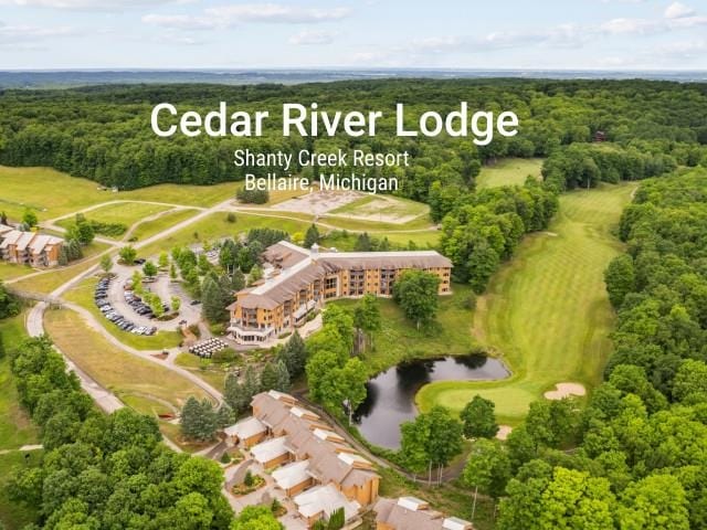 2400 Troon S, Bellaire, MI 49615 - bird's eye view of a large body of water, a local golf course, apartment complex / building, and a forest