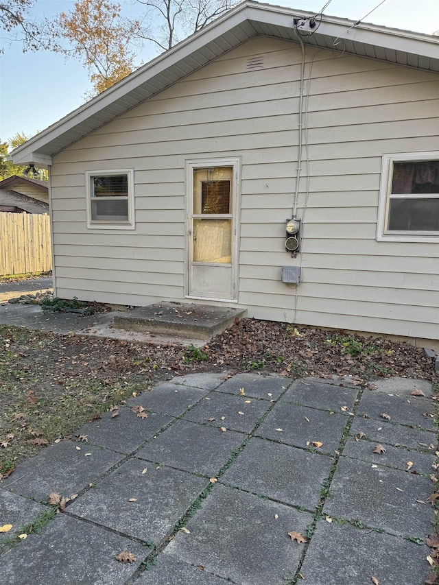 6126 Loud Dr, Oscoda, MI 48750 - view of property exterior featuring fence