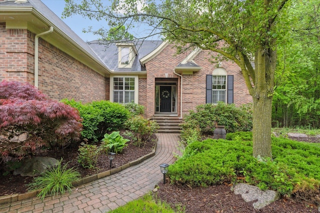 42259 White Hart Blvd, Canton, MI 48188 - doorway to property featuring brick siding