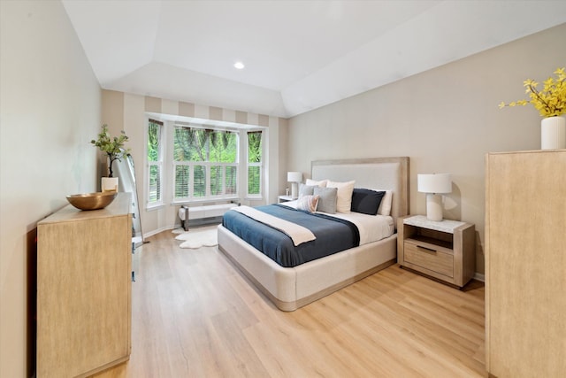 42259 White Hart Blvd, Canton, MI 48188 - bedroom with light wood-style flooring, a tray ceiling, baseboards, and recessed lighting