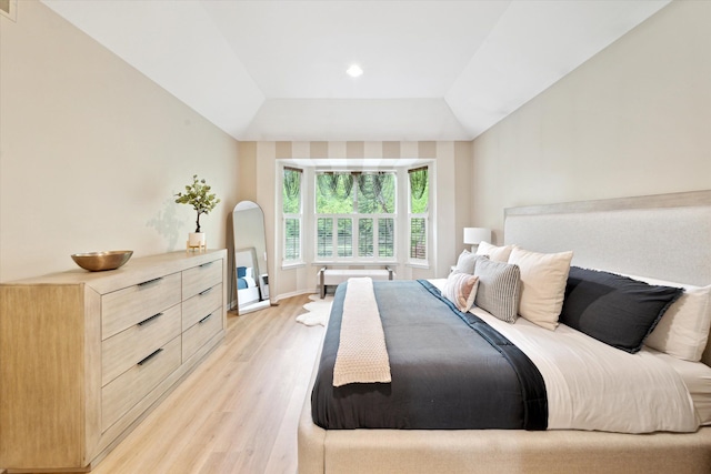 42259 White Hart Blvd, Canton, MI 48188 - bedroom with light wood-style floors, a tray ceiling, and recessed lighting