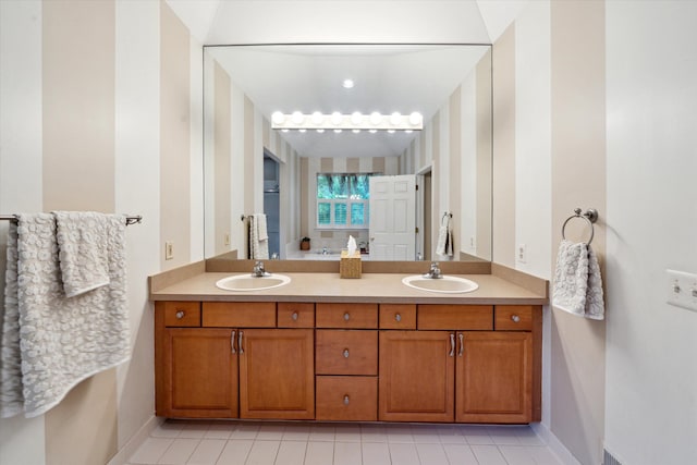 42259 White Hart Blvd, Canton, MI 48188 - bathroom with baseboards, double vanity, and tile patterned flooring