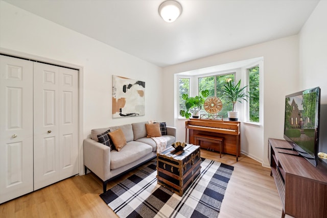 42259 White Hart Blvd, Canton, MI 48188 - living room featuring light wood-type flooring and baseboards