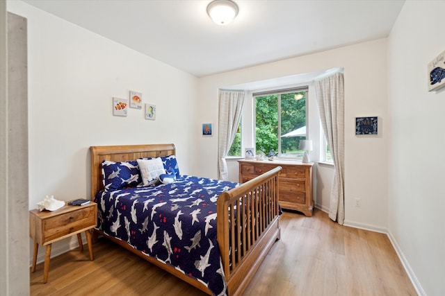 42259 White Hart Blvd, Canton, MI 48188 - bedroom featuring light wood-style floors and baseboards