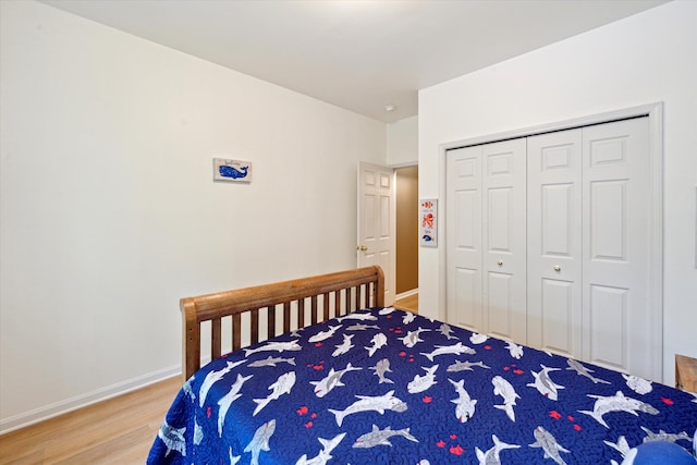 42259 White Hart Blvd, Canton, MI 48188 - bedroom featuring wood finished floors, baseboards, and a closet