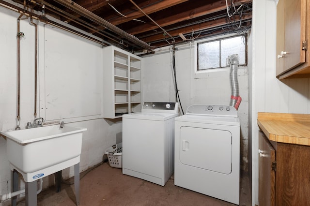 212 W Mckay St, Saline, MI 48176 - washroom with cabinet space and washer and clothes dryer