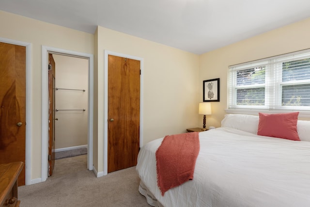 212 W Mckay St, Saline, MI 48176 - carpeted bedroom featuring baseboards