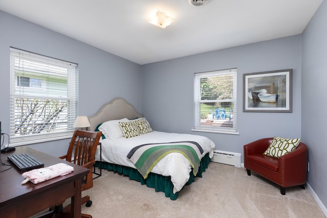 212 W Mckay St, Saline, MI 48176 - bedroom with baseboard heating, carpet floors, baseboards, and a desk