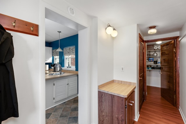 212 W Mckay St, Saline, MI 48176 - bathroom featuring vanity and baseboards