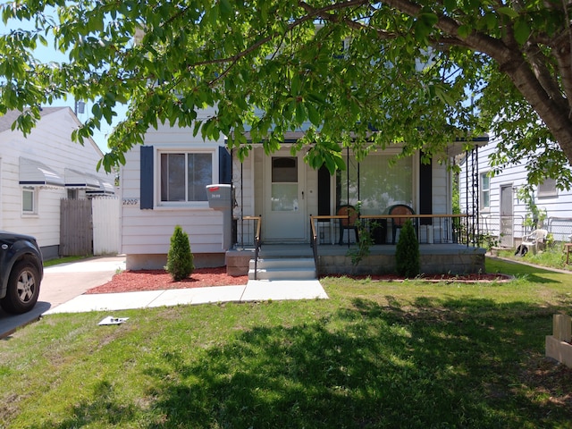 2209 Progress Ave, Lincoln Park, MI 48146 - view of front of property with a porch