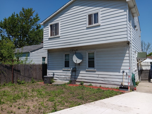 2209 Progress Ave, Lincoln Park, MI 48146 - view of front of property with fence and central air condition unit