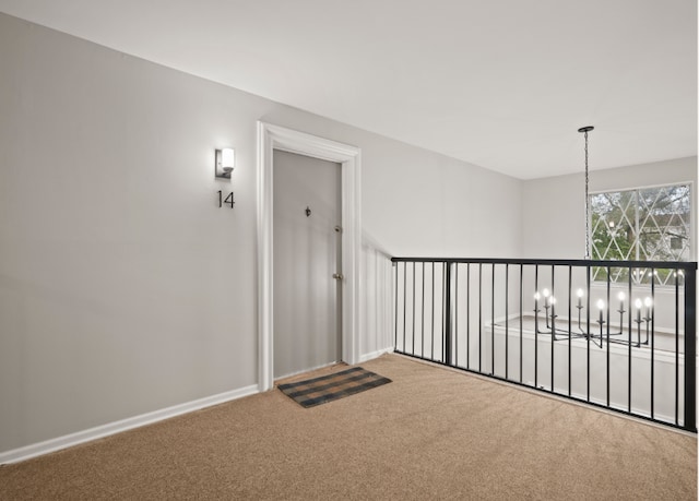 view of exterior entry featuring a balcony