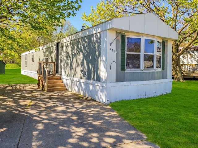 411 S Grover Ave, Alma, MI 48801 - view of front of property featuring a front lawn