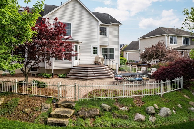 1433 Bicentennial Pkwy, Ann Arbor, MI 48108 - back of house with a fenced backyard and a patio area