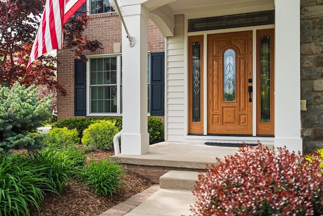1433 Bicentennial Pkwy, Ann Arbor, MI 48108 - entrance to property featuring brick siding and a porch