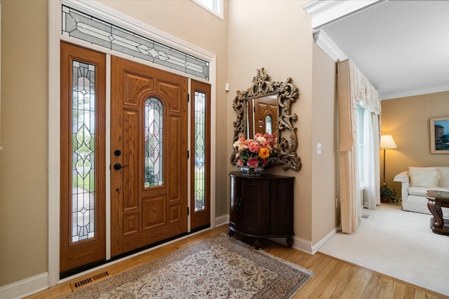 1433 Bicentennial Pkwy, Ann Arbor, MI 48108 - foyer featuring wood-type flooring, baseboards, and crown molding