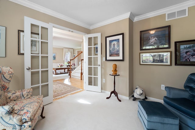 1433 Bicentennial Pkwy, Ann Arbor, MI 48108 - sitting room featuring french doors, ornamental molding, stairs, carpet floors, and baseboards